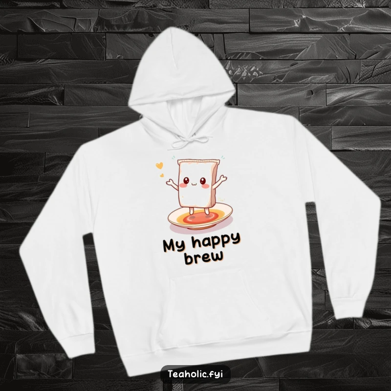 Funny kawaii tea bag character dancing joyfully on a saucer, a cute and funny hoodie.