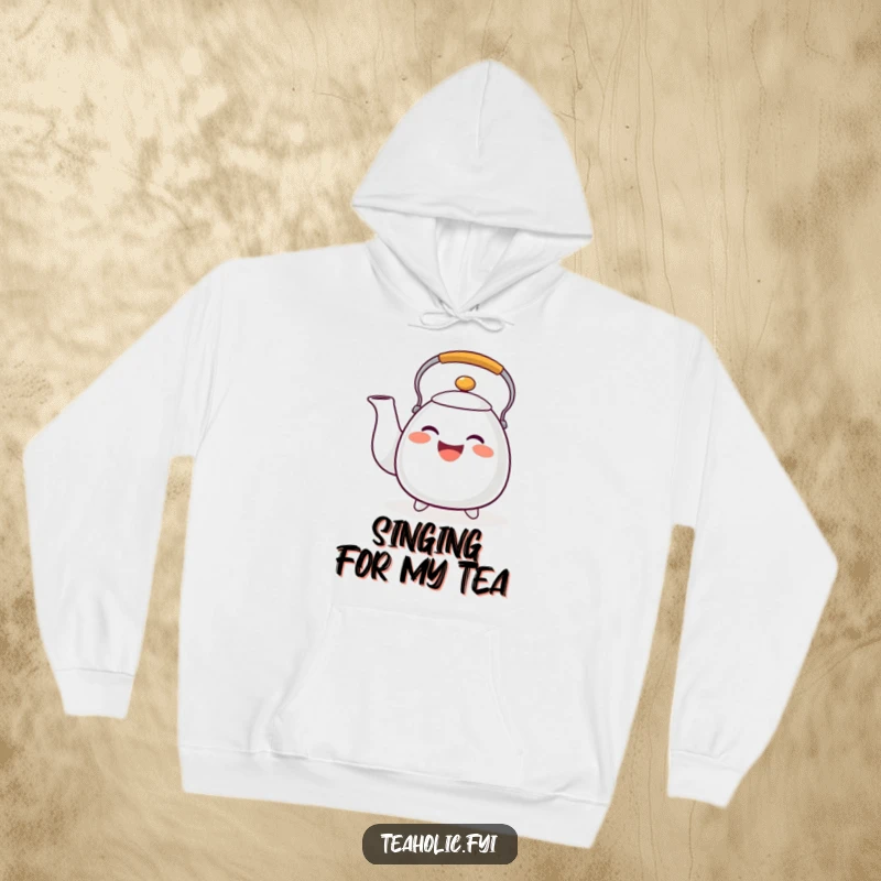 Funny tea kettle hoodie featuring a happy whistling character, ideal for staying warm and as a funny gift.