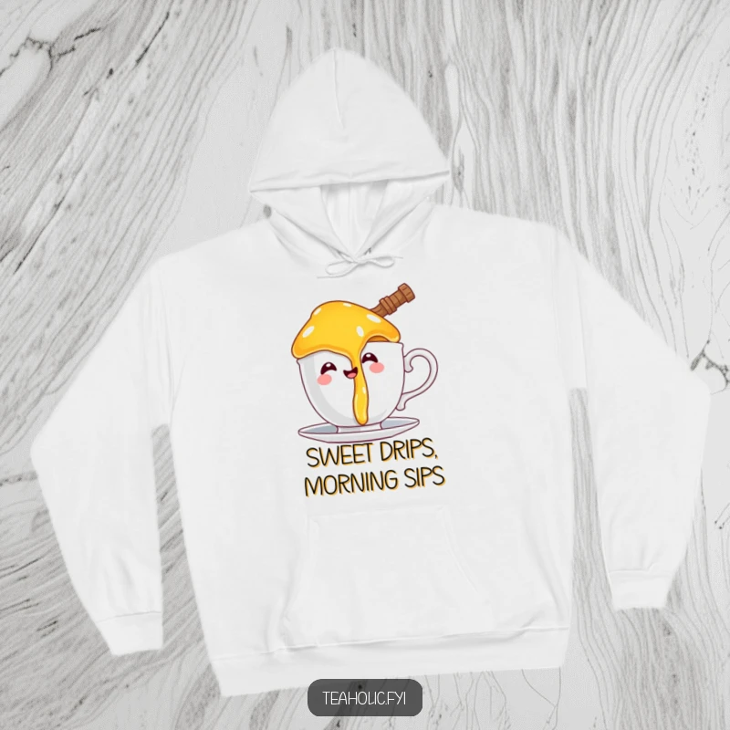 Funny hoodie showing a happy honey pot character comically dripping onto a teacup handle, perfect for cozy, humorous wear.