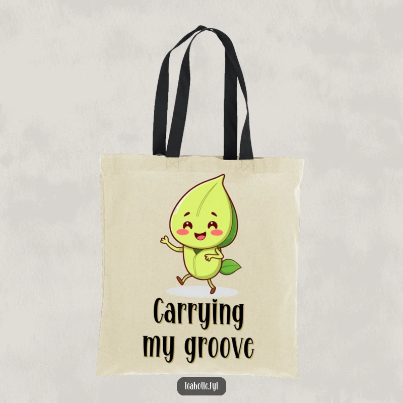 Funny tote bag illustrated with a smiling tea leaf character doing a joyful jig, a charming and spirited accessory.